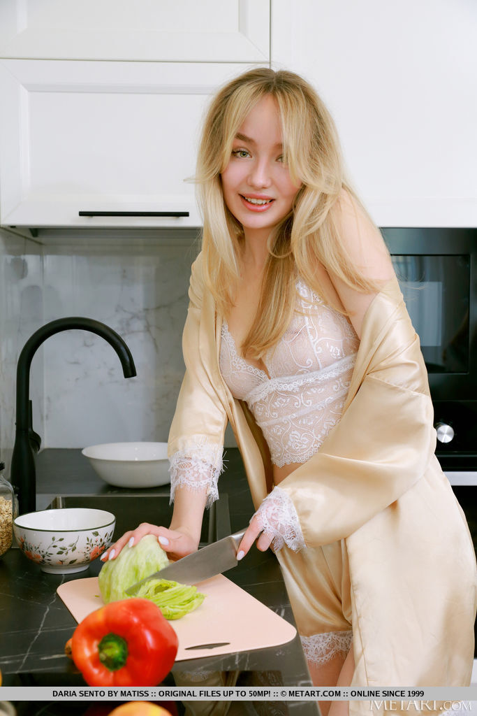 Blonde Strips Naked While Cooking 2